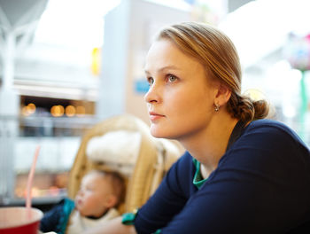 Woman looking away at home