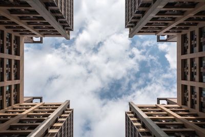Low angle view of skyscrapers against sky