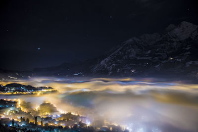 Scenic view of lake at night