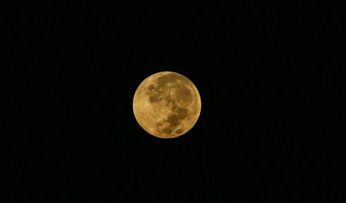 Low angle view of moon in sky