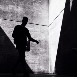 Shadow of people on wall