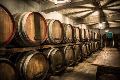 Row of wine bottles in container