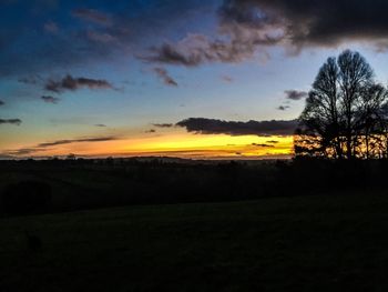 Scenic view of landscape at sunset