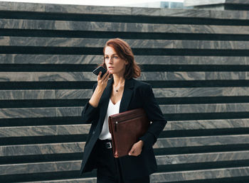 Young woman using mobile phone