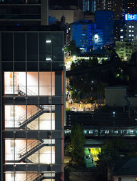 Modern buildings in city at night