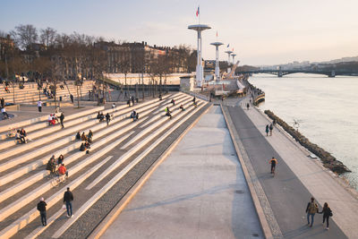 High angle view of people on quayside against sky