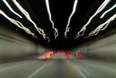 Light trails on road in tunnel