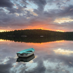 Boat on lake at sunset, kåsjön, gothenburg, sweden