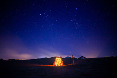 Scenic view of illuminated star field against sky at night