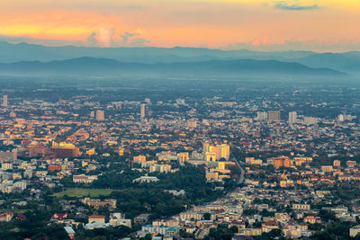 High angle view of townscape against sky during sunset