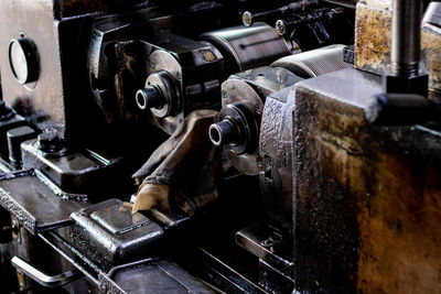Close-up of old machinery in factory