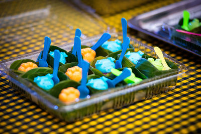 High angle view of fruits in basket on table