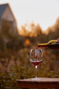 Close-up of wineglass on glass