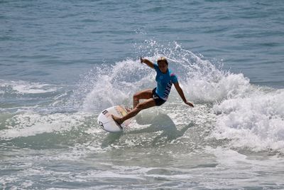 Man surfing in sea