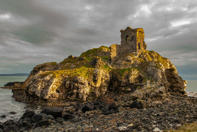 Kinbane castle against clouds