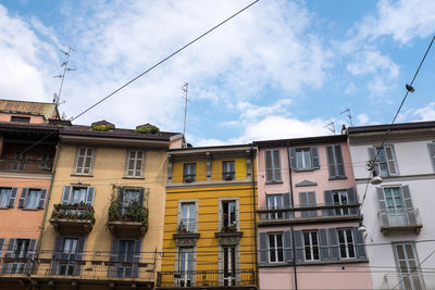 Low angle view of residential building against sky