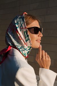 Close-up of woman wearing sunglasses