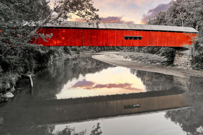 Bridge over river against sky