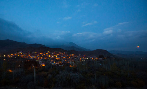 Illuminated cityscape at night