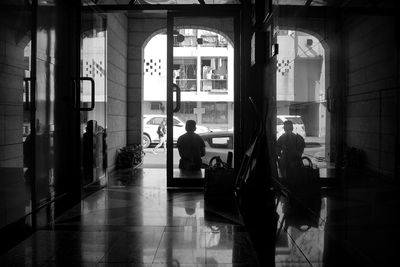 People sitting in corridor