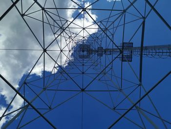Low angle view of pylon against sky
