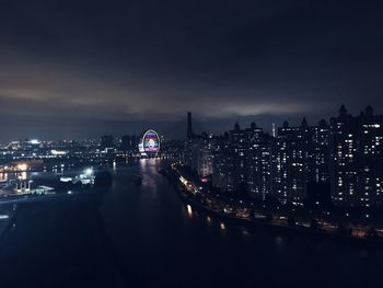 Illuminated buildings in city at night