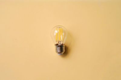 High angle view of light bulb on table