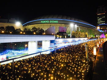 Illuminated city buildings at night