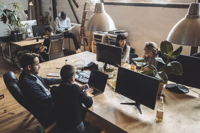 Group of people working on table