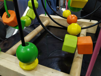 High angle view of multi colored toys on table