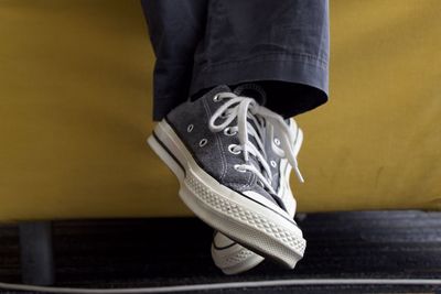 Low section of man standing on floor