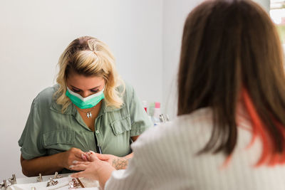 Woman getting her nails done