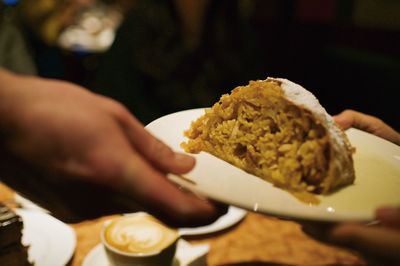 Close-up of person eating food