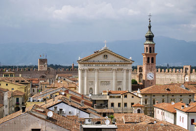 High angle view of buildings in city against sky