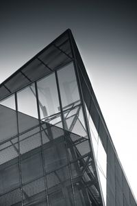 Low angle view of modern building against clear sky