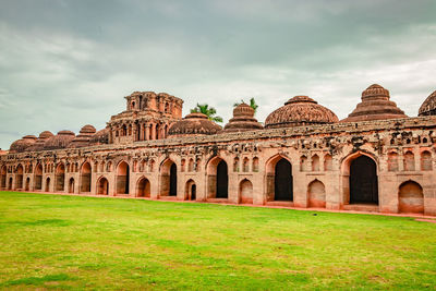 View of historical building against cloudy sky