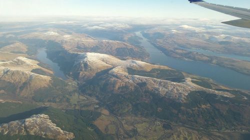 Aerial view of mountains against sky