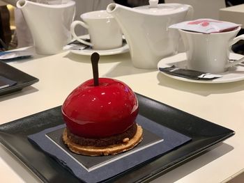 Close-up of cake served on table