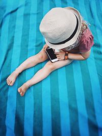 Young woman holding smart phone