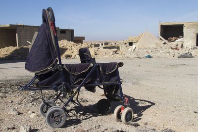 Deserted baby stroller in syria