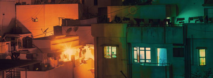 Illuminated residential building at night