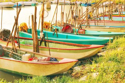 Boats moored in water