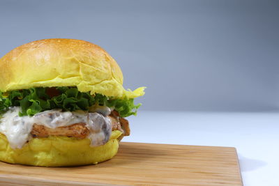 Close-up of burger on table