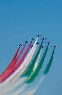 Low angle view of airshow against sky