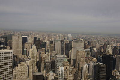 Aerial view of cityscape against sky