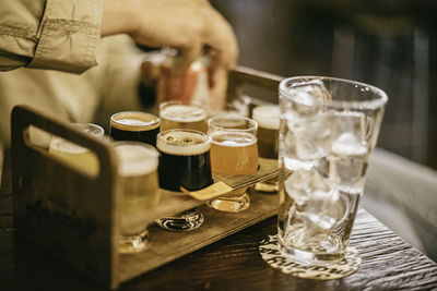 Close-up of wine glasses on table