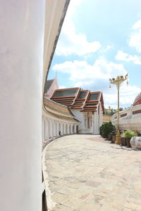 Building against cloudy sky