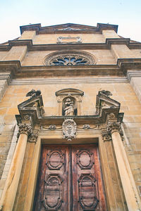 Low angle view of ornate building against sky