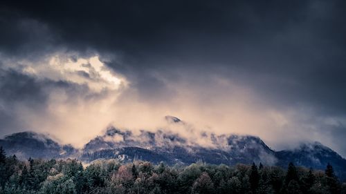 Scenic view of mountains against sky during sunset