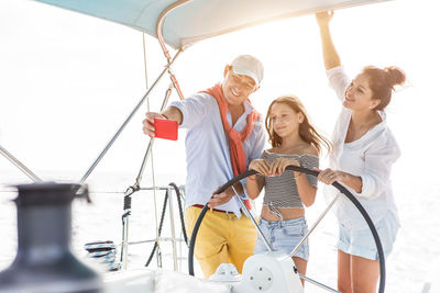 People on boat sailing in sea